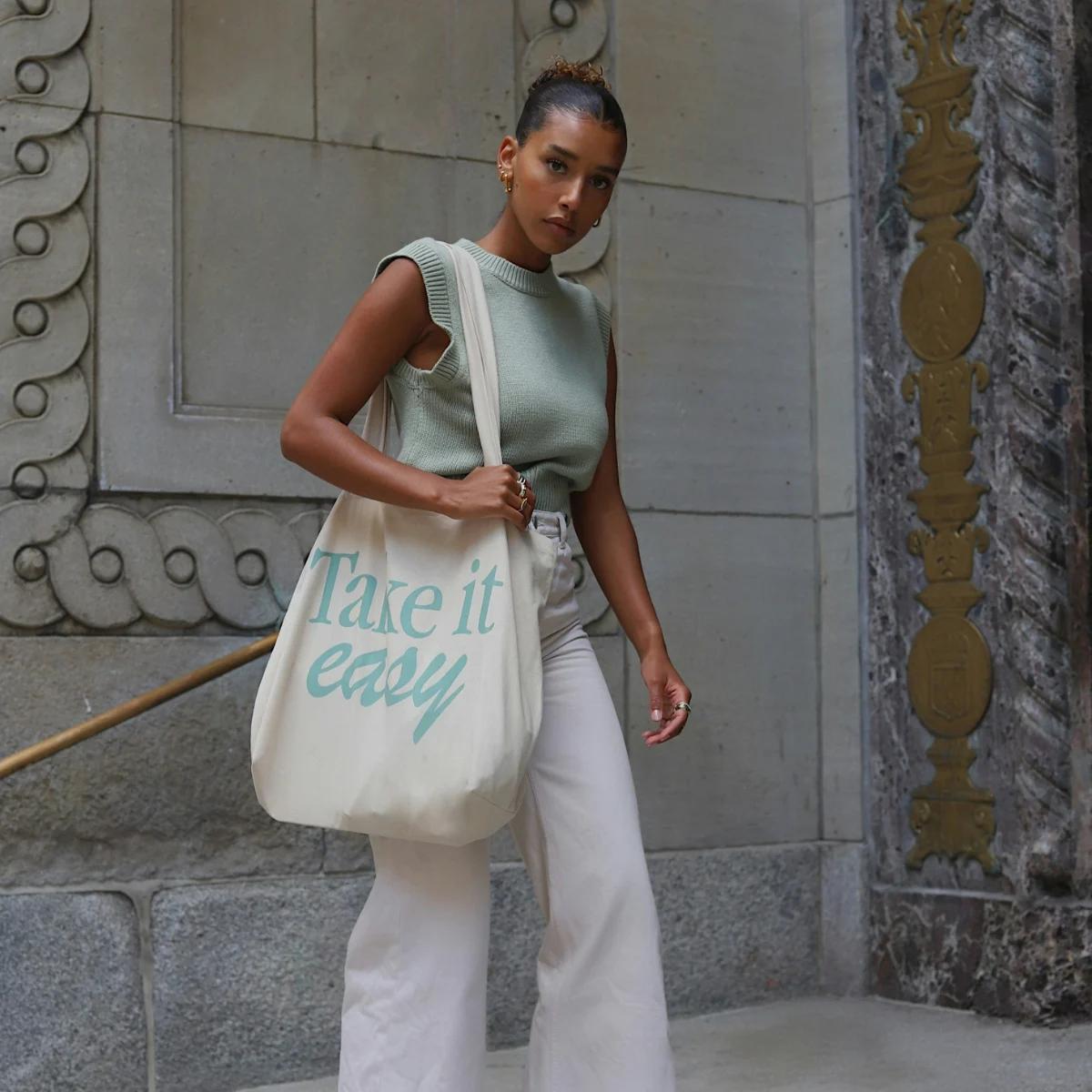 find me an outfit like that, but beige trousers